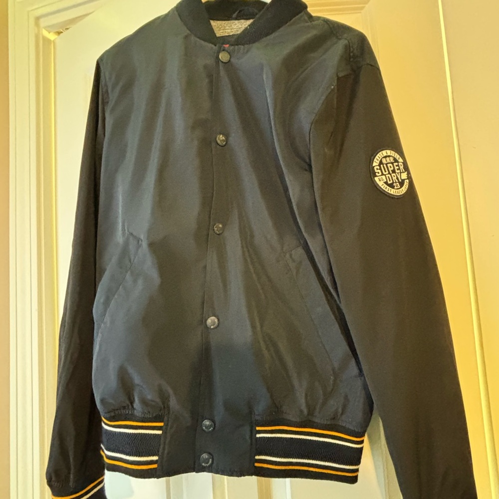 Superdry Men's Navy Bomber Jacket with Yellow and White Stripes on Cuffs